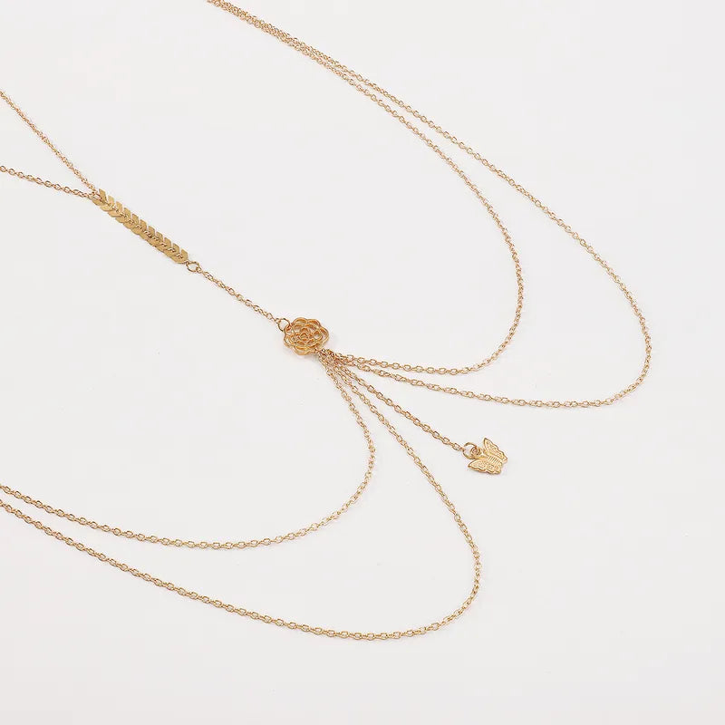 Chaîne de corps femme avec motifs fleur et papillon