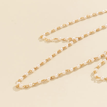 Chaîne de corps femme avec perles imitation et plaquage
